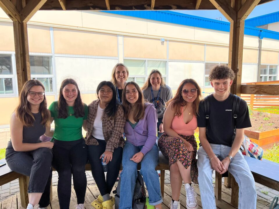 students-at-hammarskjold-farewell-event-sitting-in-gazebo-together