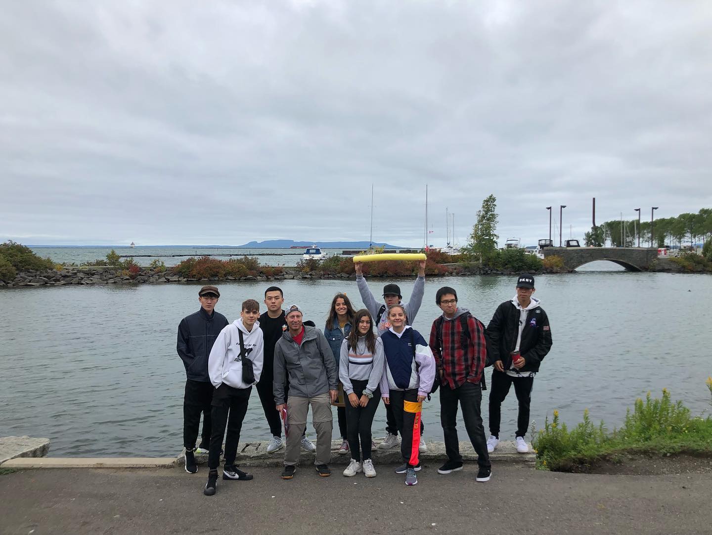 International Students at Prince Arthur's Landing Marina in front of the Sleeping Giant