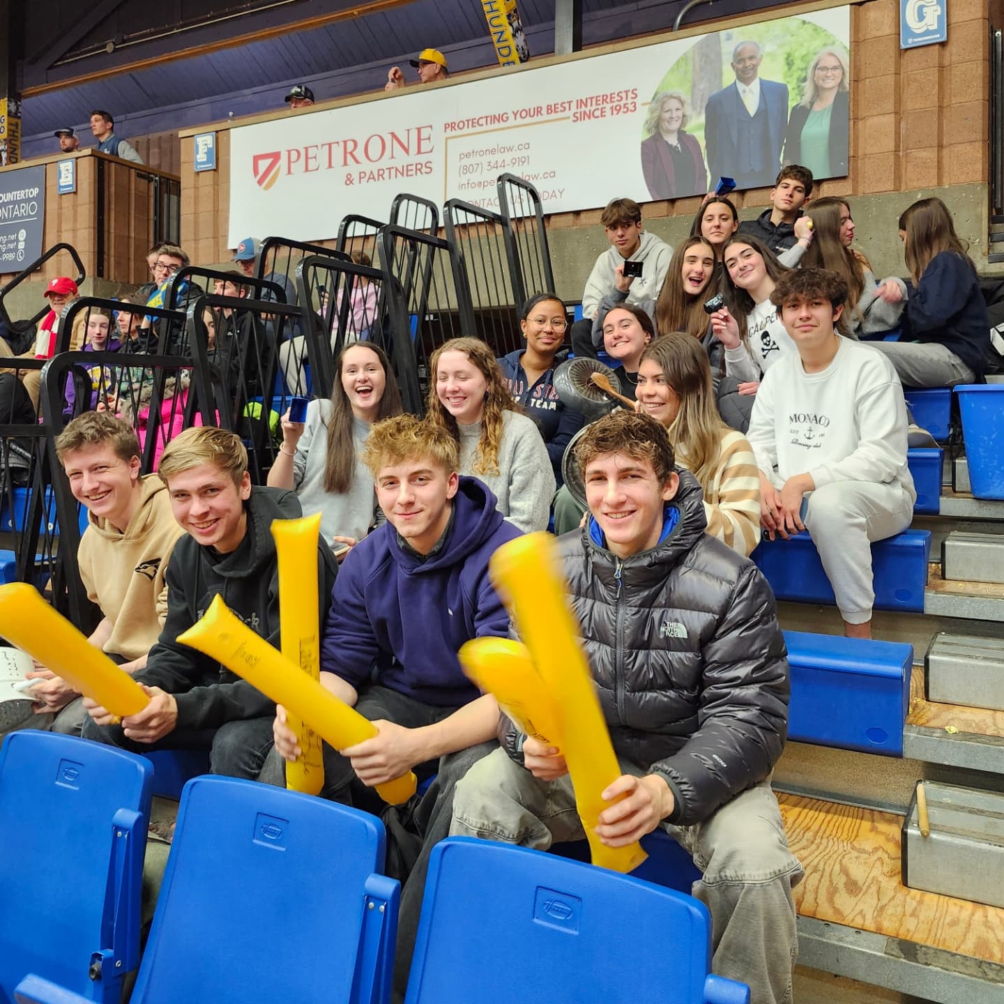 International students watching a Lakehead University basketball game