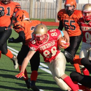 hammarskjold-and-westgate-players-playing-football
